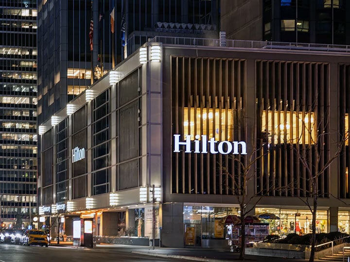 street view of New York Hilton Midtown at night