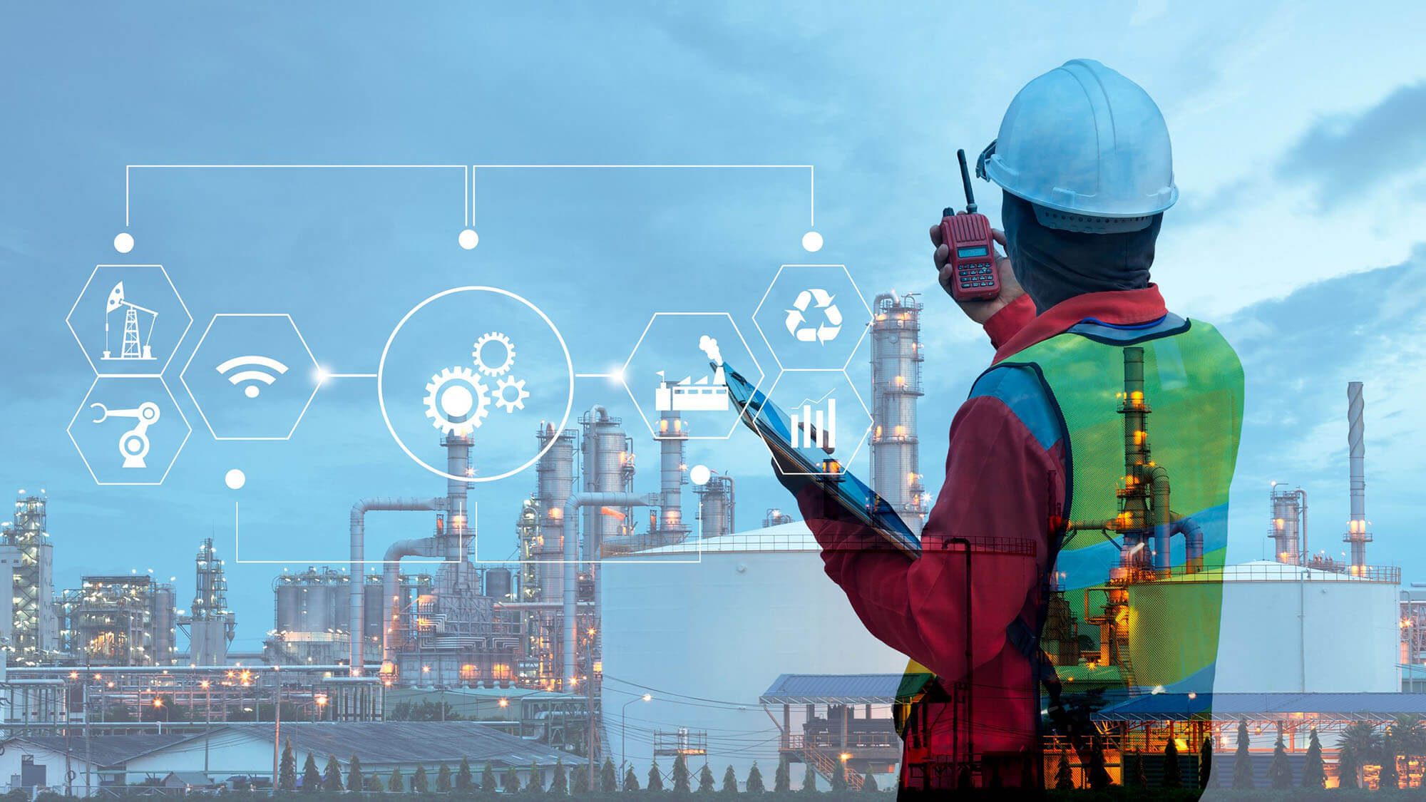 Double exposure of technician engineer with safety helmet with oil refinery industry plant background 