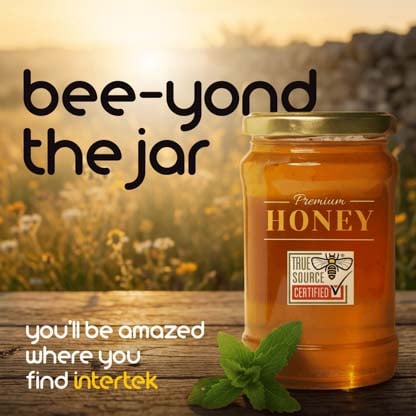 A jar of honey with a True Source certification label